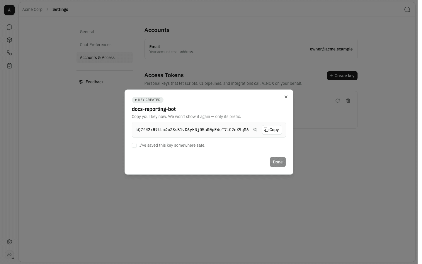 Key created dialog showing the key value once, with Copy and acknowledgement controls