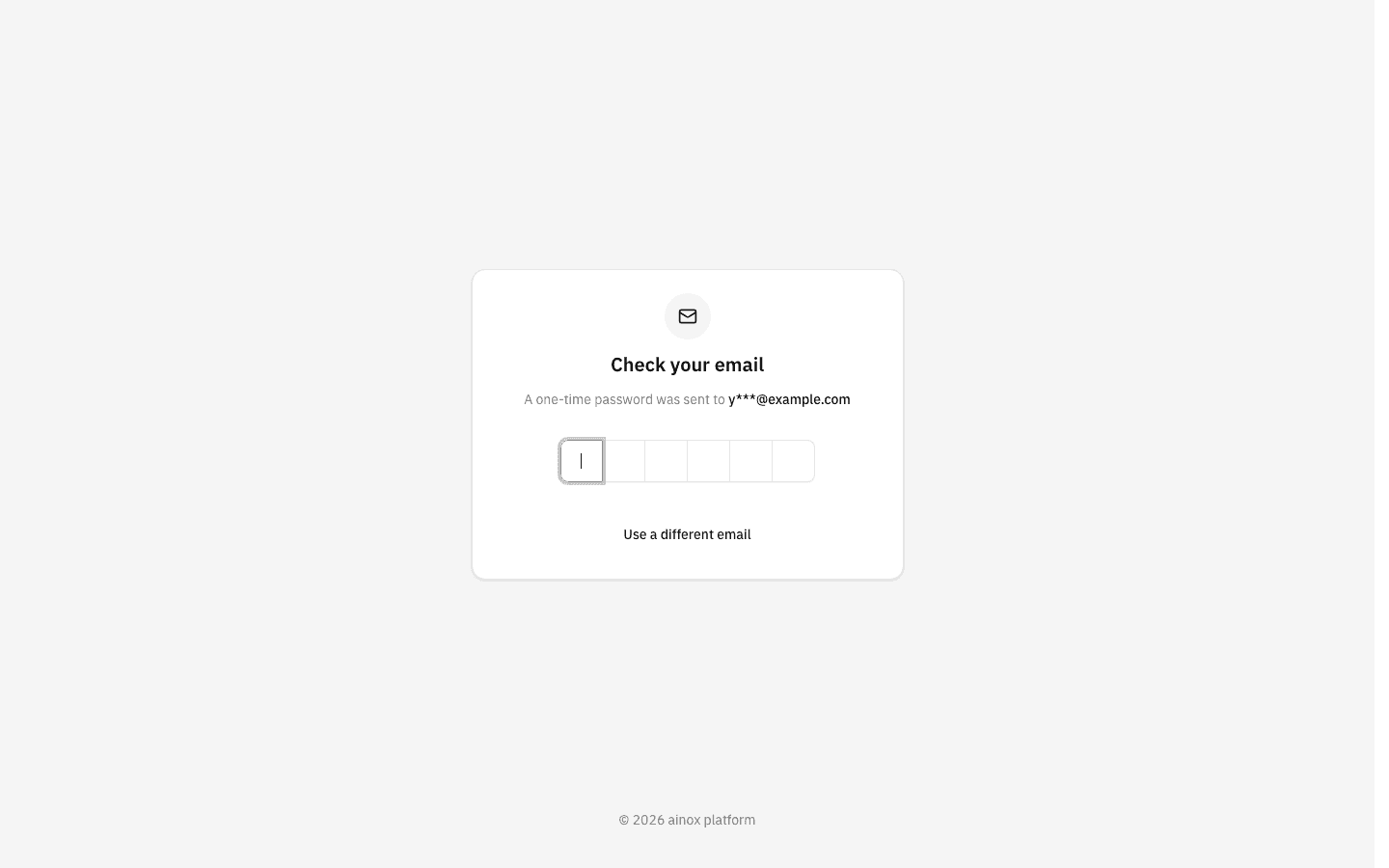 The "Check your email" screen with a mail icon, the masked address and six empty code boxes